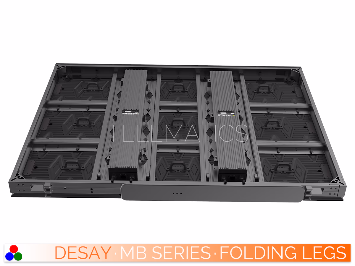 The Art Of LED · Desay MB Series · Telematics Canada Detailed view of the bottom frame of Desay MB Series cabinets lying flat, showing the retracted folding leg mechanism for perimeter setups.