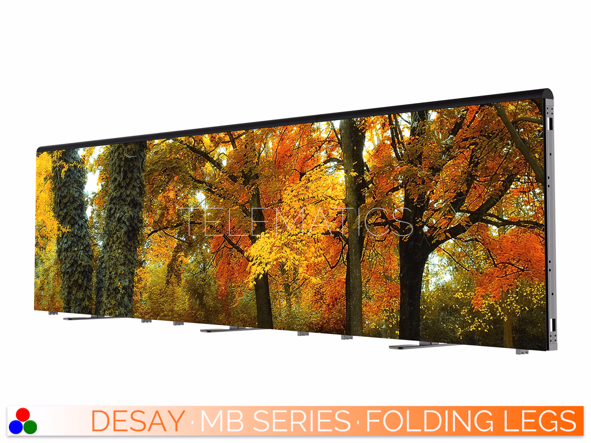 The Art Of LED · Desay MB Series · Telematics Canada Front view of a Desay MB Series perimeter LED video wall displaying vivid autumn forest imagery, supported by floor-mounted folding legs.