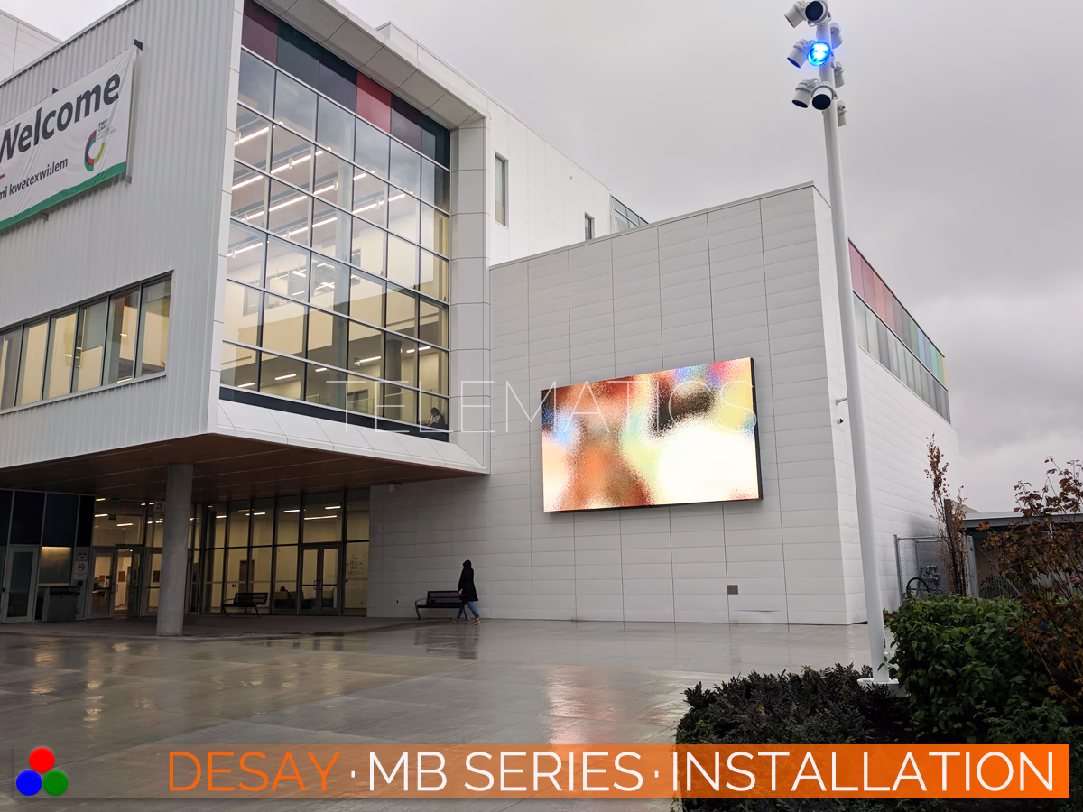 The Art Of LED · Desay MB Series · Telematics Canada Exterior architectural application of the Desay MB Series LED display at Emily Carr University, showcasing clear visibility and color performance in overcast outdoor conditions.